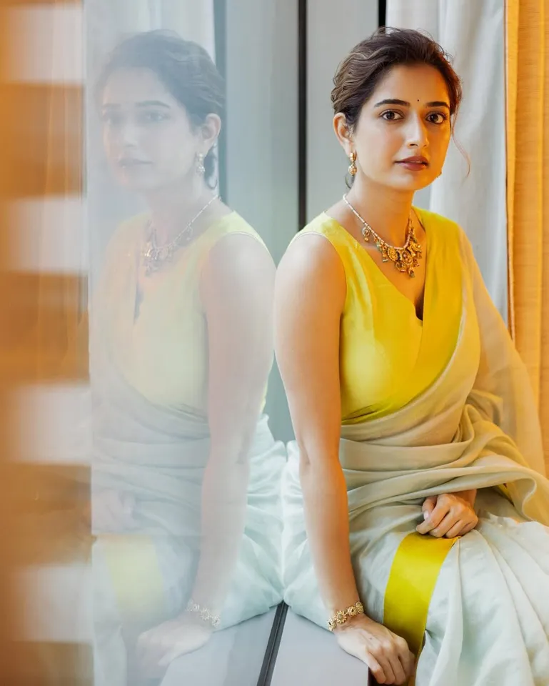 ashika ranganath yellow dress photos