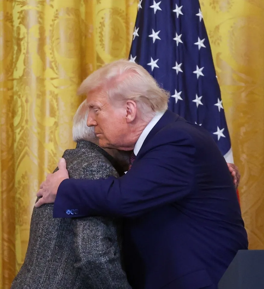Trump- Modi hug