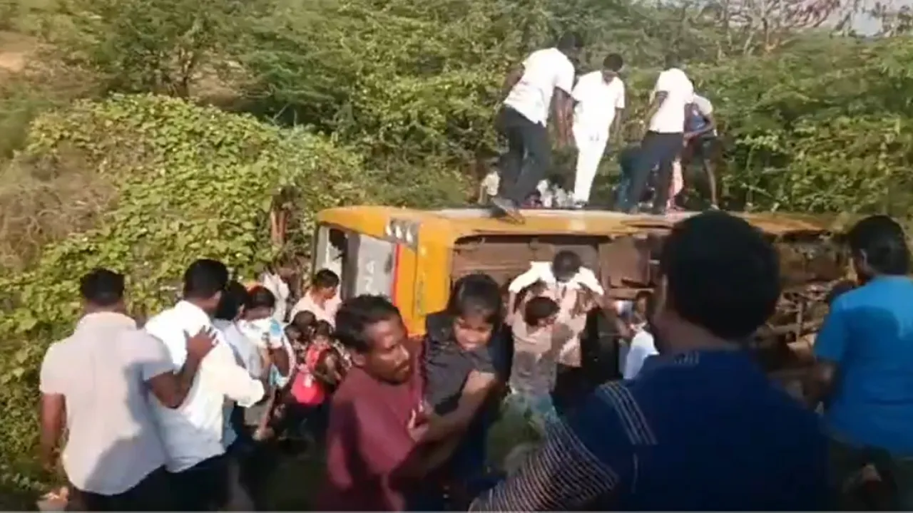 School bus overturns