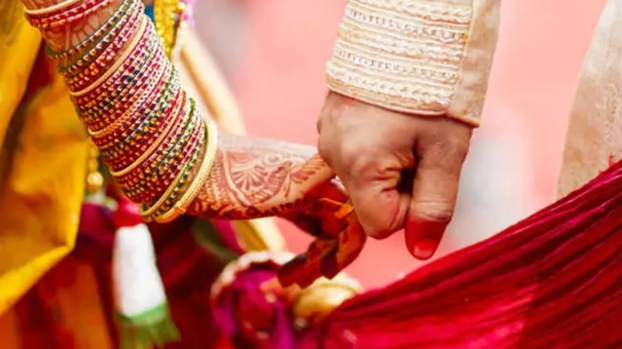 bride mother sits on wedding benche with Groom in Uttar Pradesh