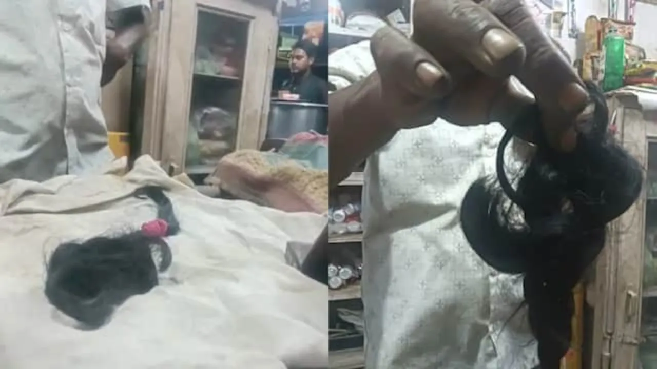 Husband cuts wife hair
