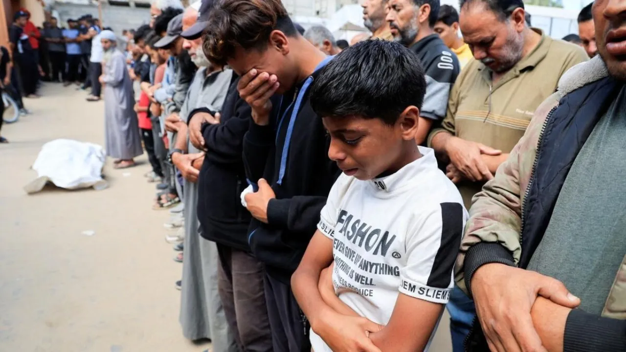 At least 27 Palestinians killed by Israeli fire near aid centre, Gaza authorities say