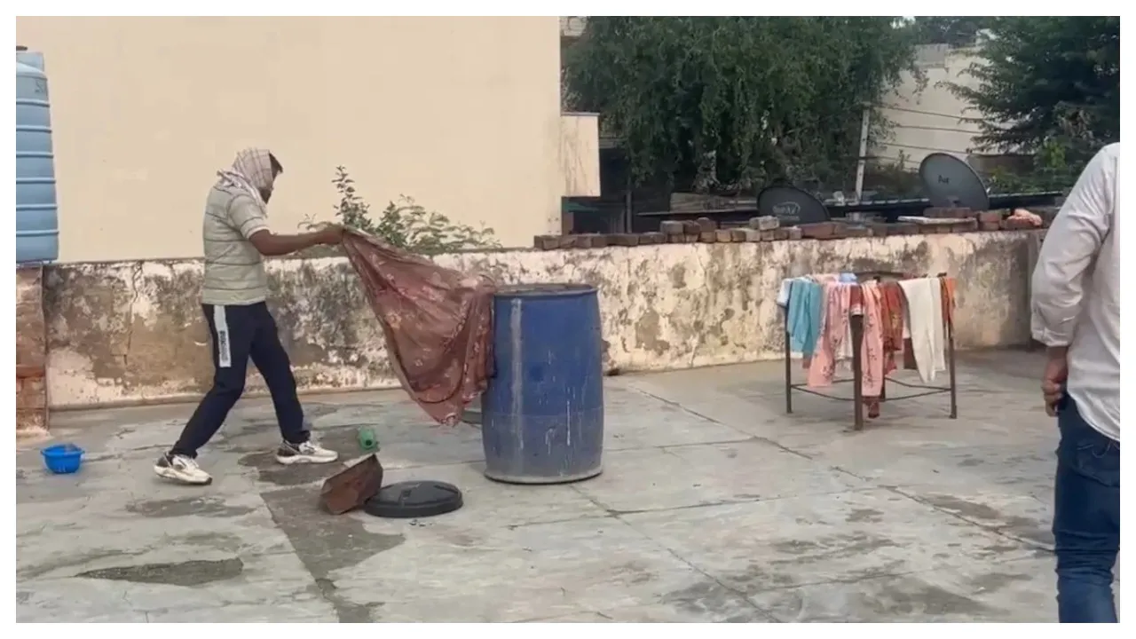 Husband's dead body in Blue Drum