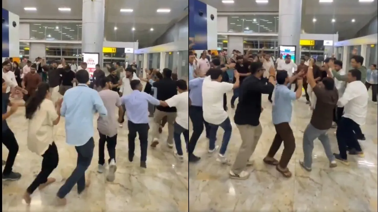 Passengers perform Garba at the airport
