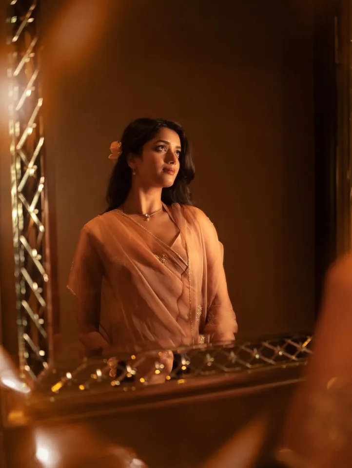 Bhagyashri in black six