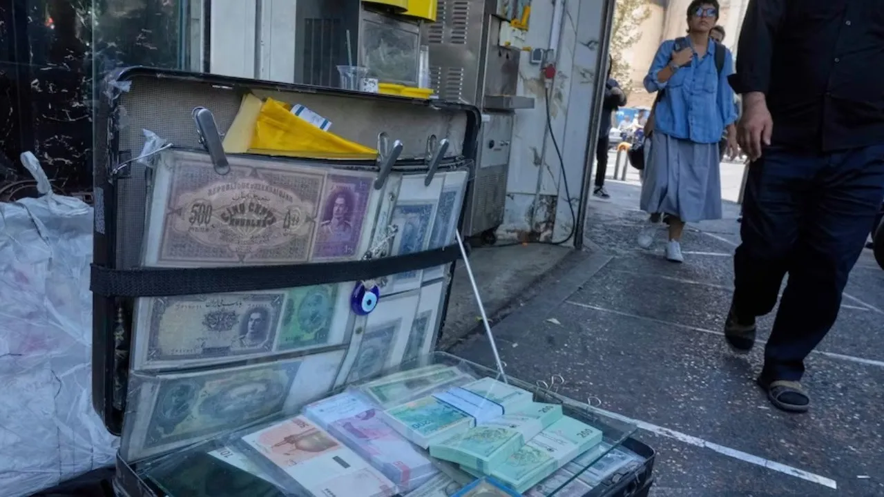 Iran’s currency falls to a new low as nuclear sanctions squeeze its ailing economy