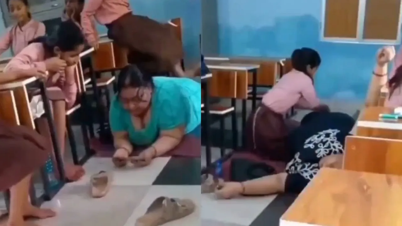 Headmaster suspended after a viral video showed students giving her a body massage