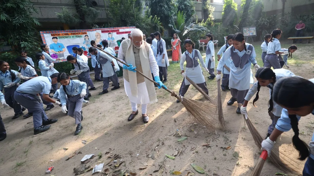 PM Modi with broom
