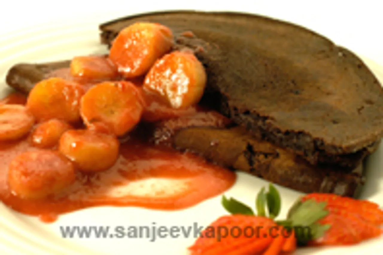 Chocolate Pancakes With Strawberry And Banana Sauc