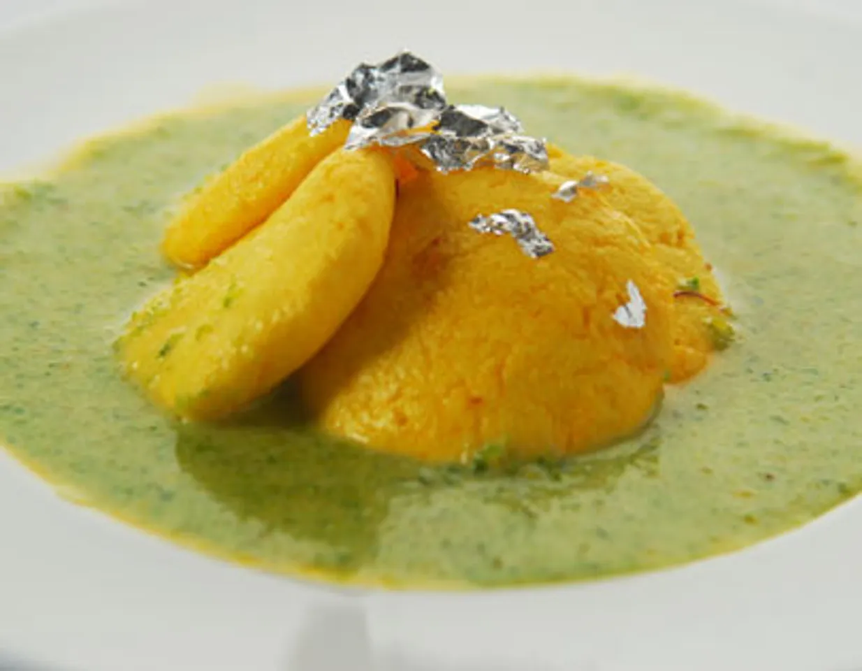 Orange Rasmalai With Pista Coulis