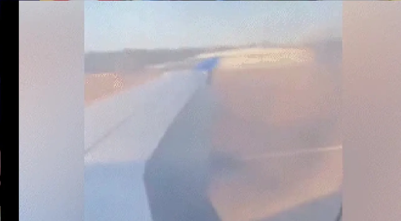 Video: US airliner catches fire on runway, passenger yells 'Please get us out'