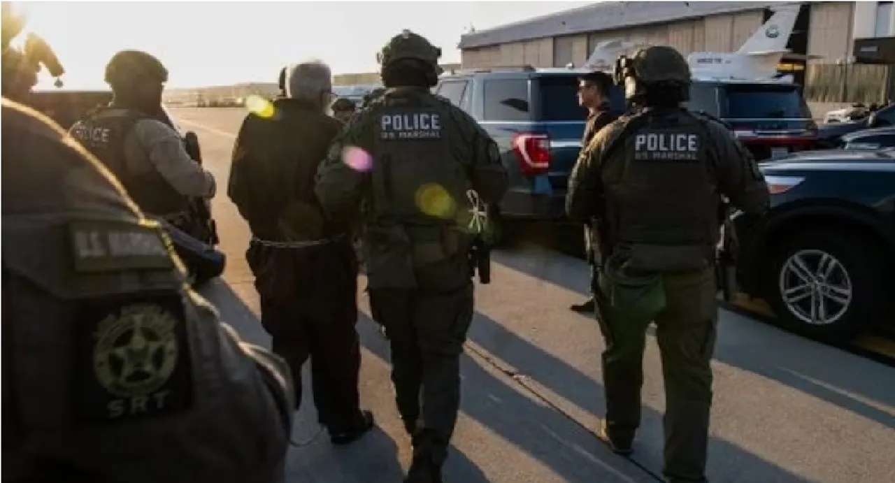 Pics show Tahawwur Rana, in chains, handed over to NIA team by US Marshals