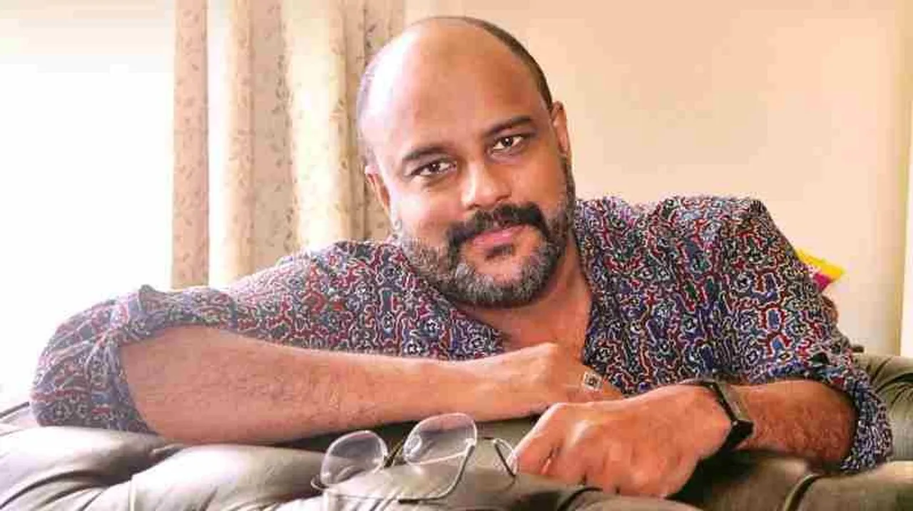 Murali_Gopi_writing_a_book