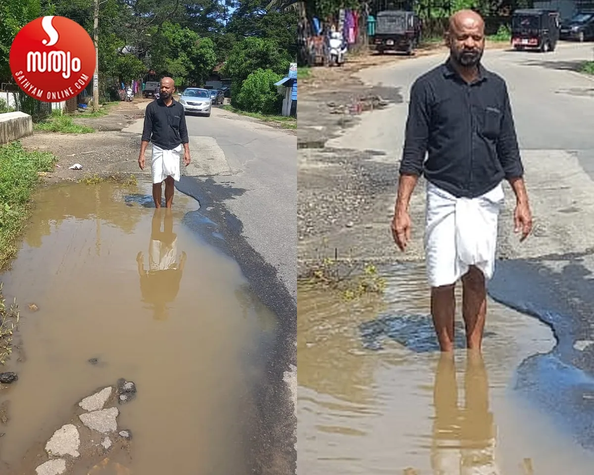 huge pit on road