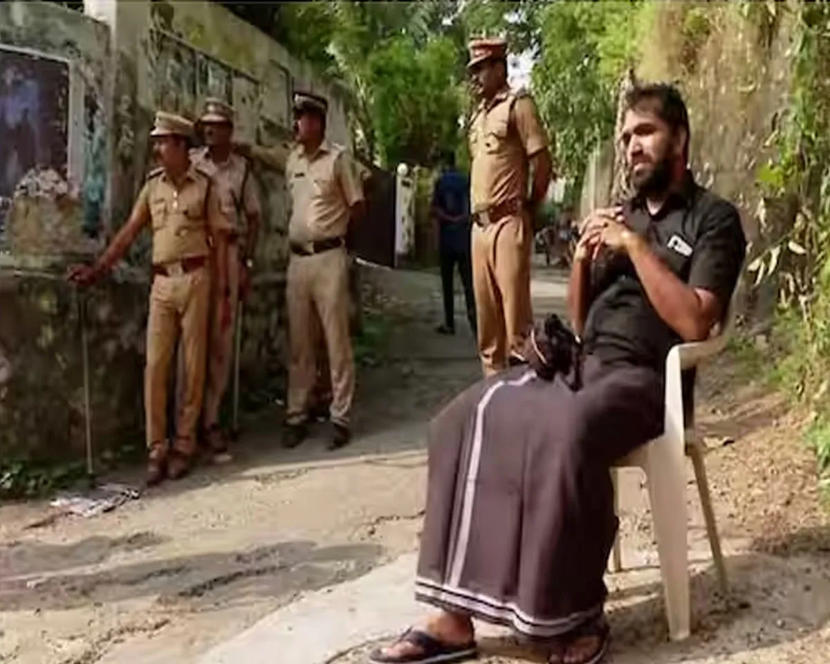 chandy oomman black.jpg