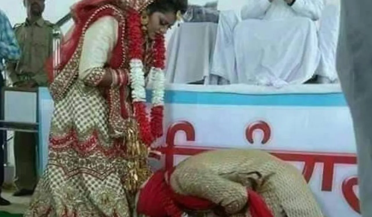 Groom Touches Bride's Feet