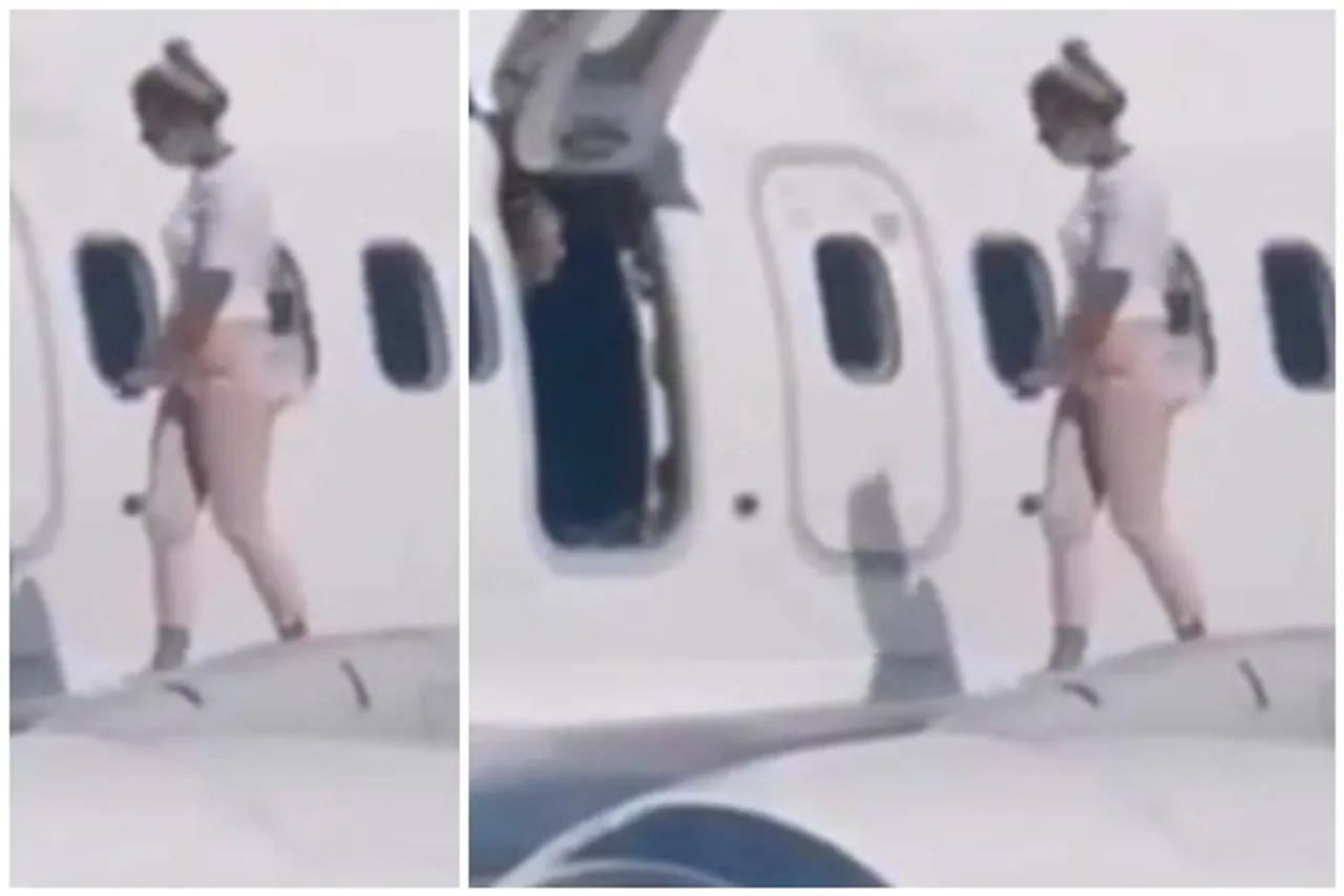 Woman Walks Onto Aeroplane Wing