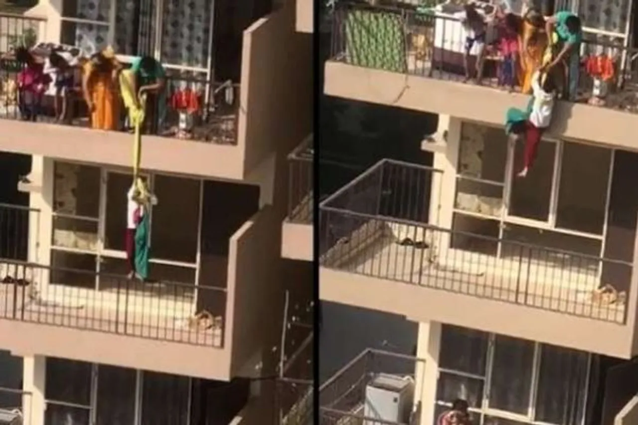 woman hangs child from 10th floor
