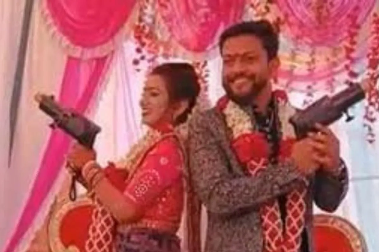 Bride Pulls Off Gun Stunt On Wedding Day
