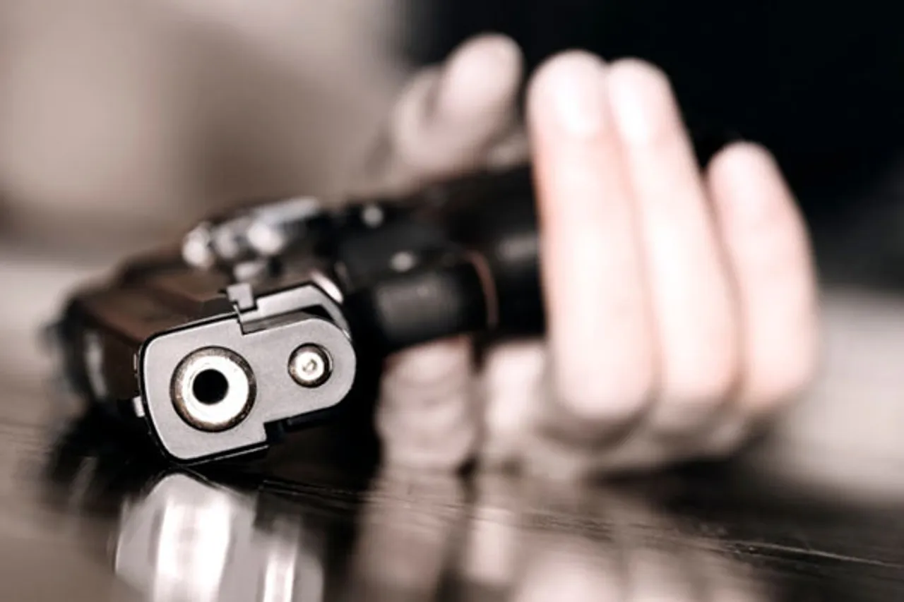 woman shoots selfie with gun, Girl shot village head's husband
