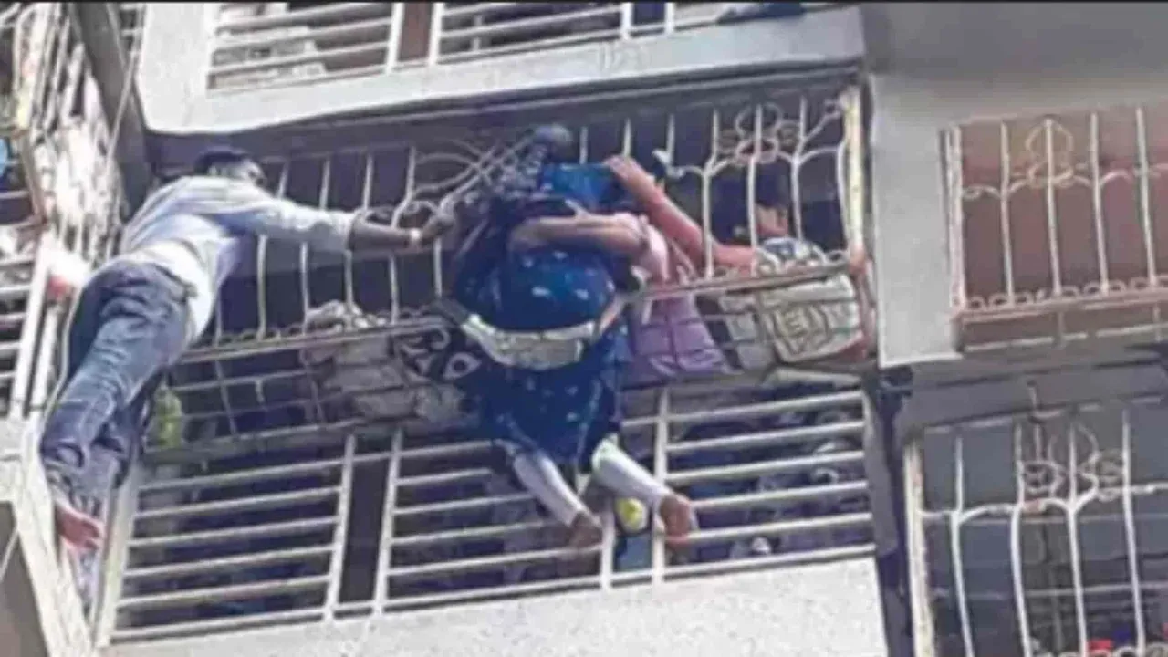 woman falls off balcony