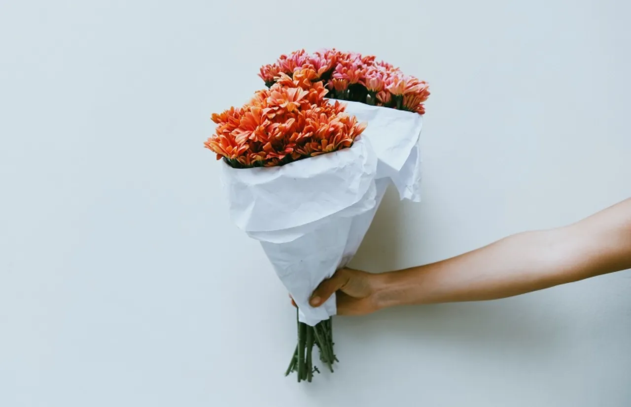 giving out flowers on TikTok
