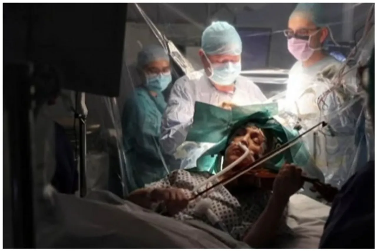 Woman play violin brain surgery
