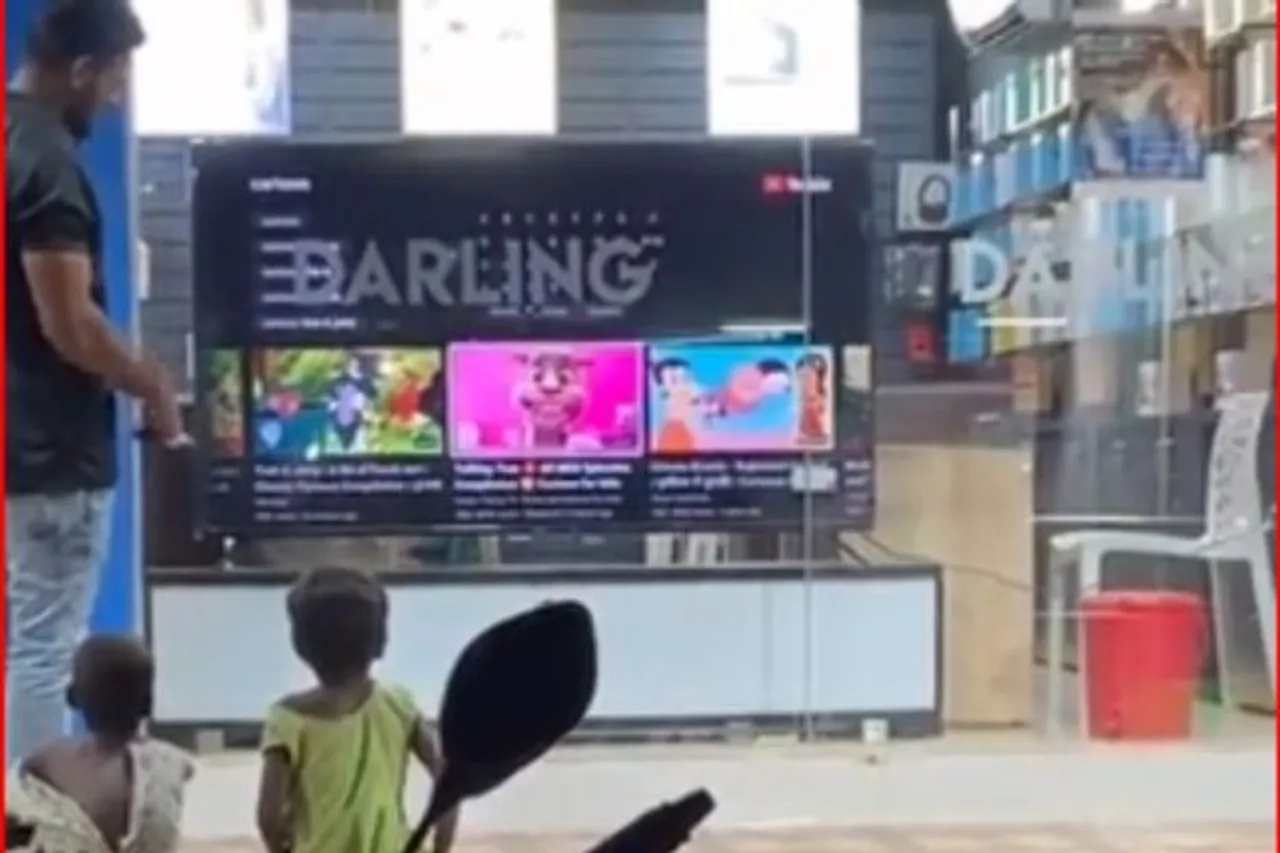 salesman puts cartoon for street kids