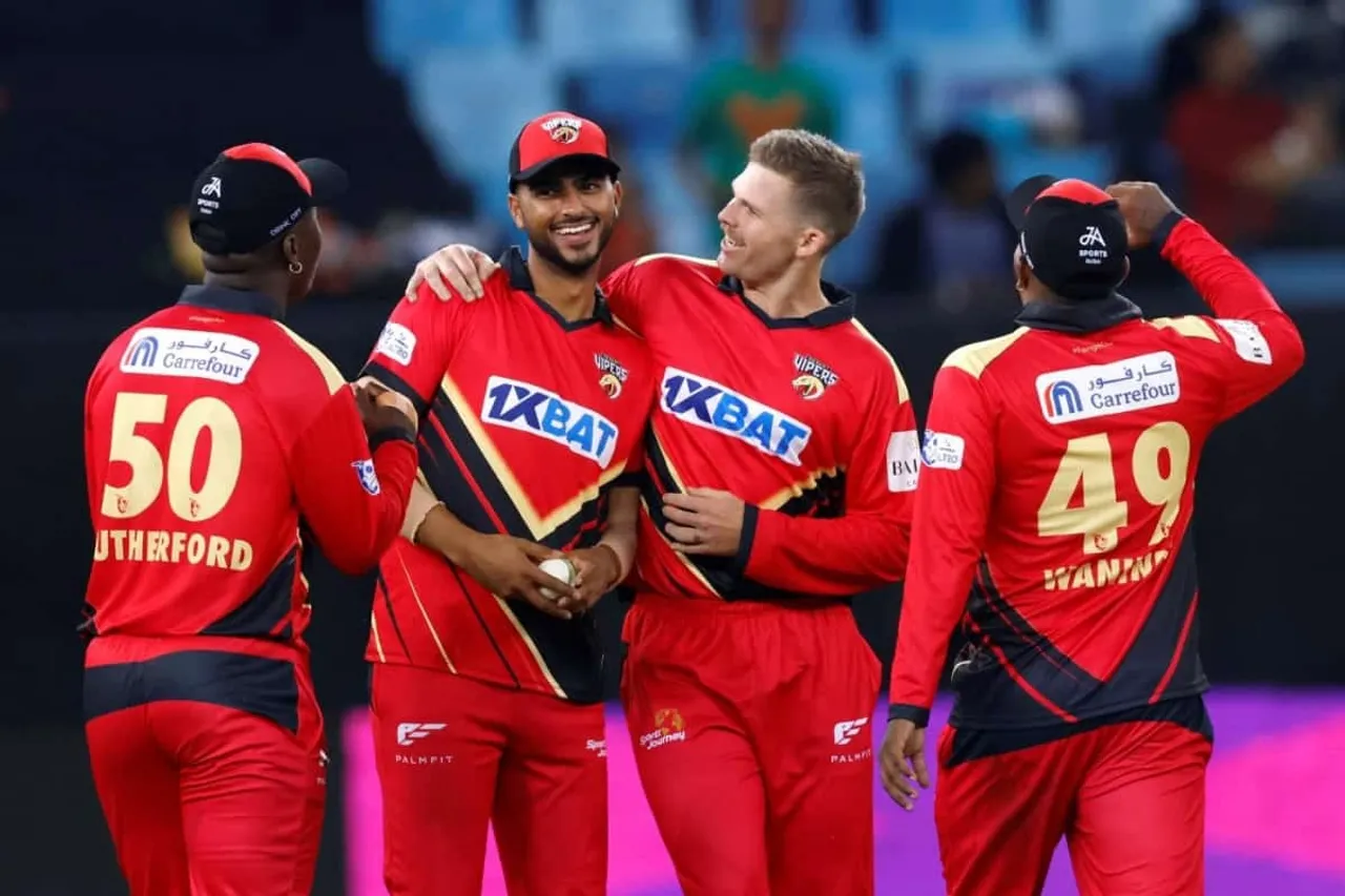 Ali-Naseer-and-Lockie-Ferguson-celebrating-with-teammates