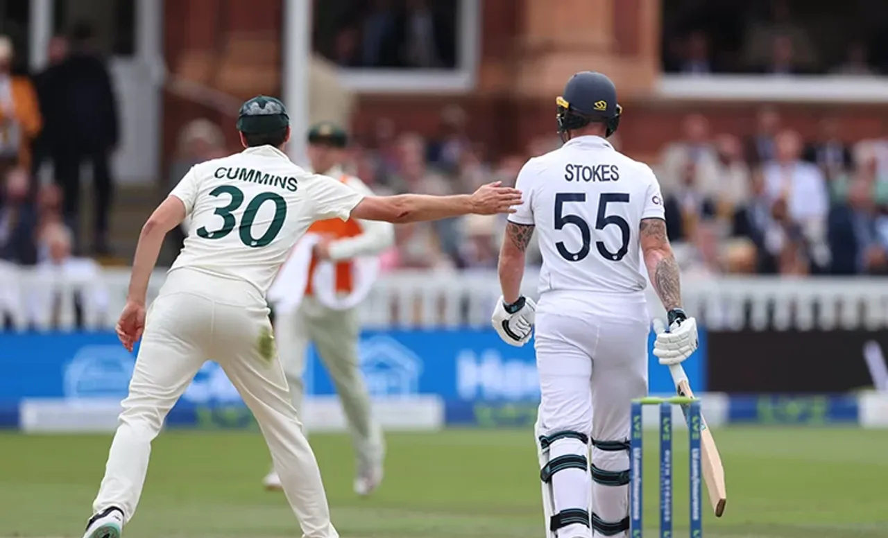 Pat Cummins pats Ben Stokes