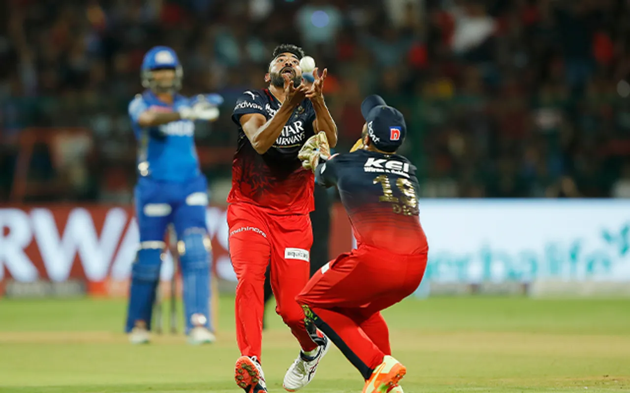 Dinesh Karthik and Mohammed Siraj