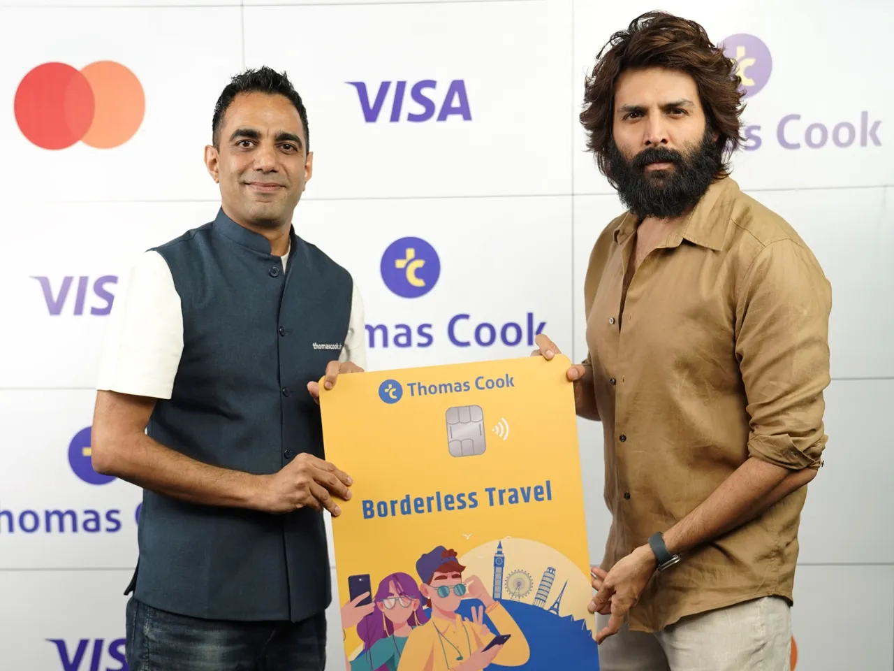 Bollywood star Kartik Aaryan with Deepesh Varma, Executive Vice President - Foreign Exchange, Thomas Cook (India) Limited (1).JPG