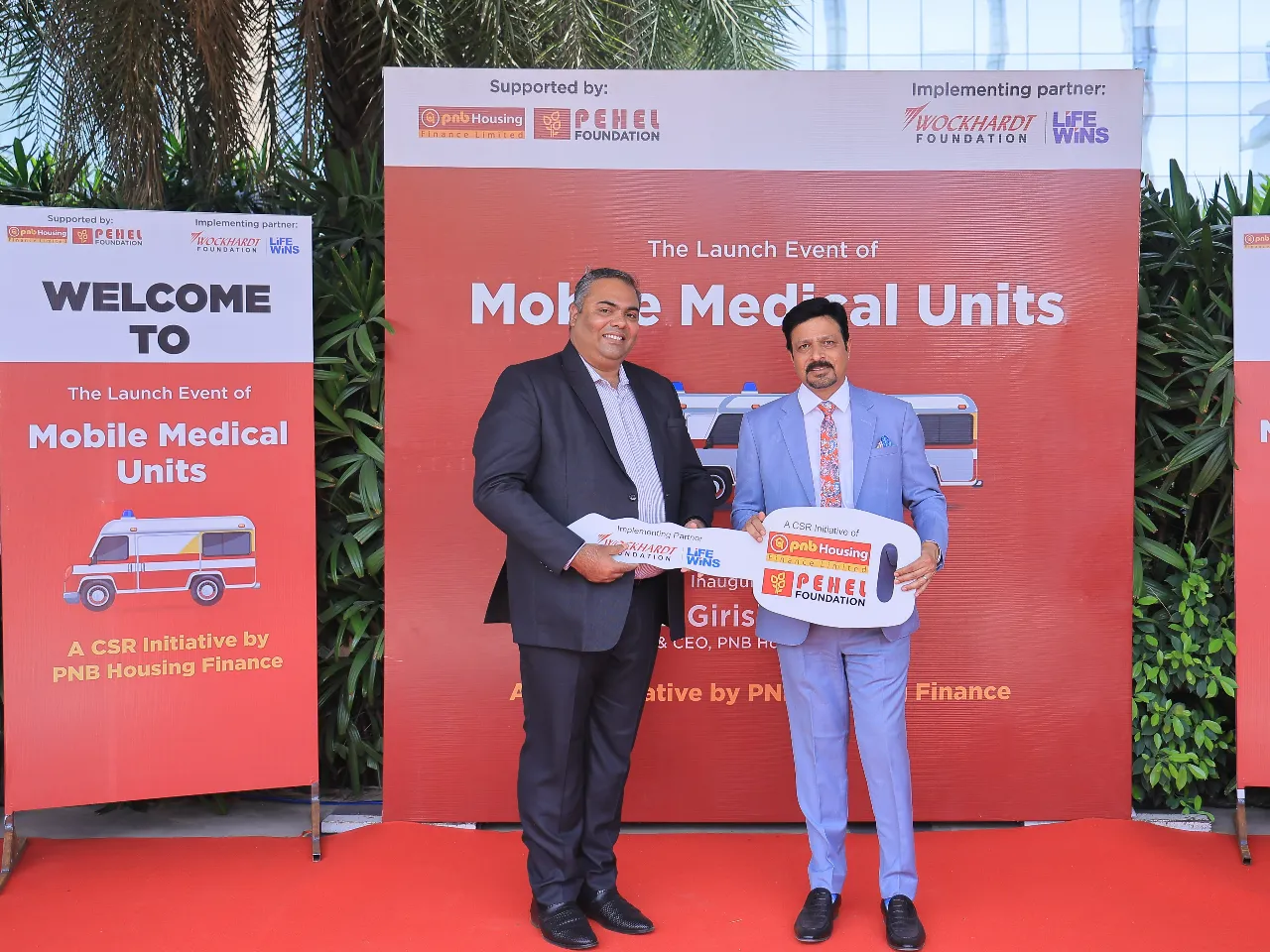 (L-R) Mr. Denis Varghese, Director, Wockhardt Foundation and Mr. Girish Kousgi, MD & CEO, PNB Housing, inaugurate the Mobile Medical Unit
