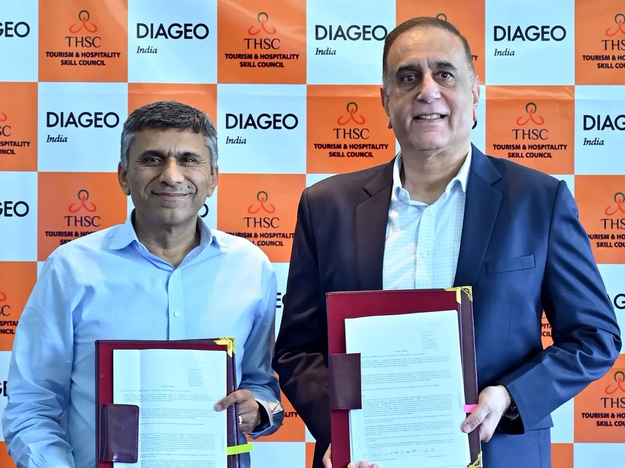 Praveen Someshwar MD and CEO Diageo India and Rajan Bahadur CEO Tourism and Hospitality Skill Council at the MoU signing ceremony