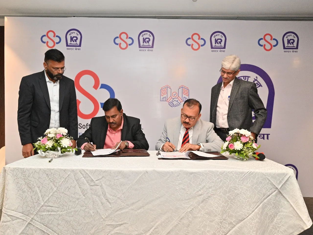 Mr Vinod Babu CEO Blue Cloud Softech Solutions Limited and Mr Santosh Kumar Jha Chairman and Managing Director Konkan Railway Corporation Limited 1