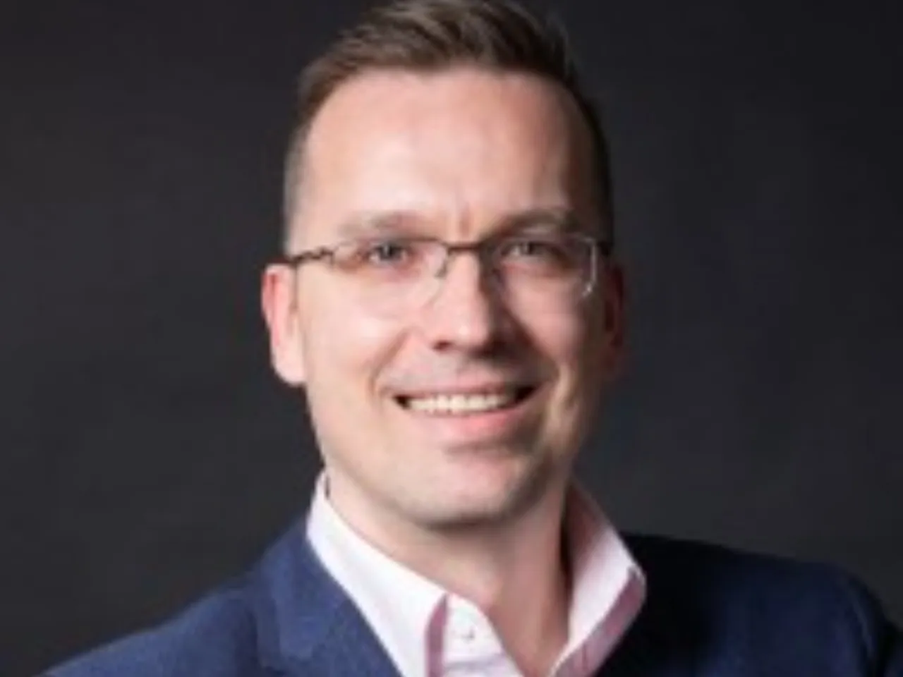 Trevor Kuna Chief Marketing Officer QNET Ltd