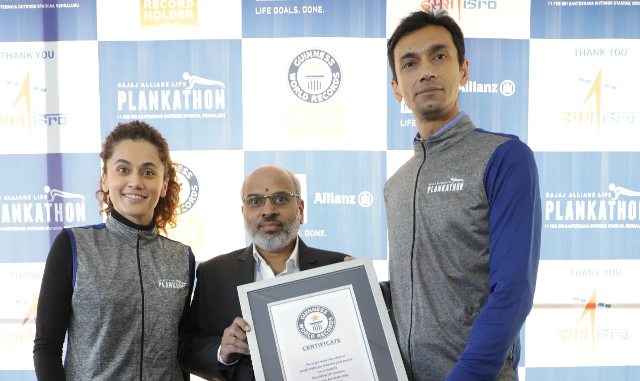 Taapsee Pannu, N Sudheer Kumar, Director, Capacity Building & Public Outreach, ISRO and Chandramohan Mehra, CMO, Bajaj Allianz Life.jpg