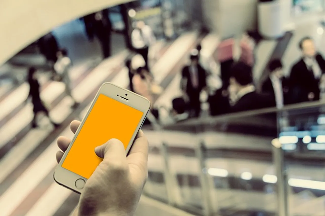 iphone mobile phone man crowd corporate business holding office