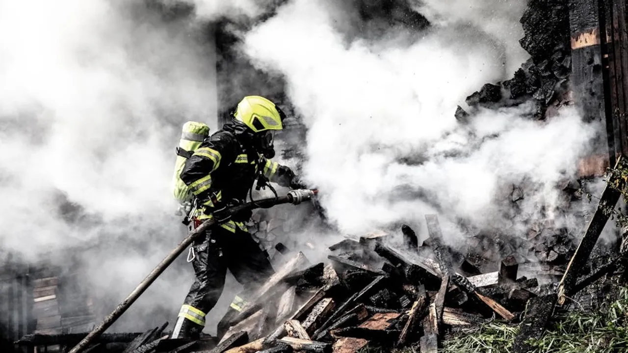 The fire resulted in total loss of stored materials, impacting the ongoing construction timeline of the project. 