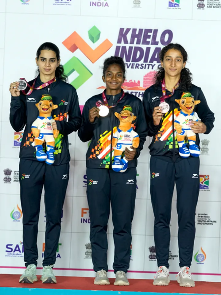 From losing her father at 9 to securing 100m gold at the Khelo India University Games (KIUG) 2025, Keerthana (Centre)’s journey to the top is a tale of stubborn perseverance