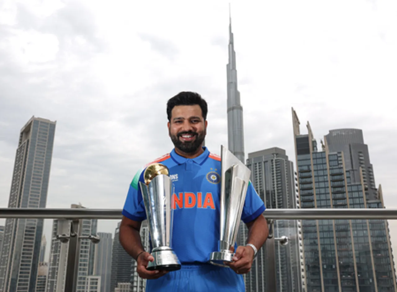 Dubai: Indian cricket captain Rohit Sharma poses with the T20 World Cup and Champions Trophy