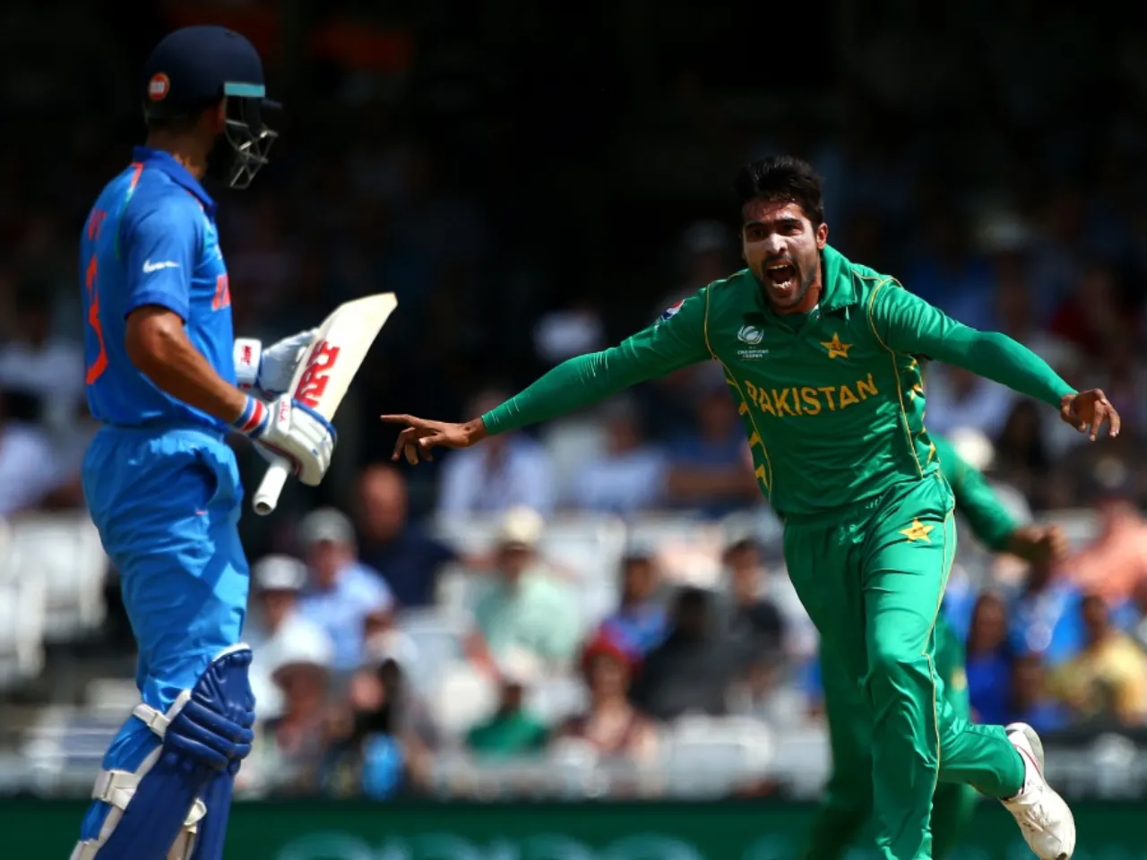 Virat Kohli and Mohammad Amir