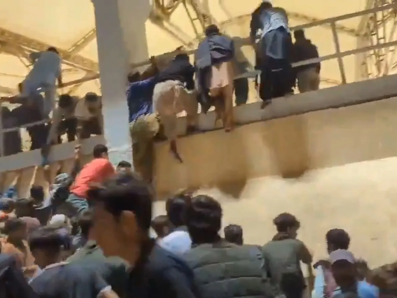 Fans climb walls to watch unveiling ceremony of new National Stadium in Karachi