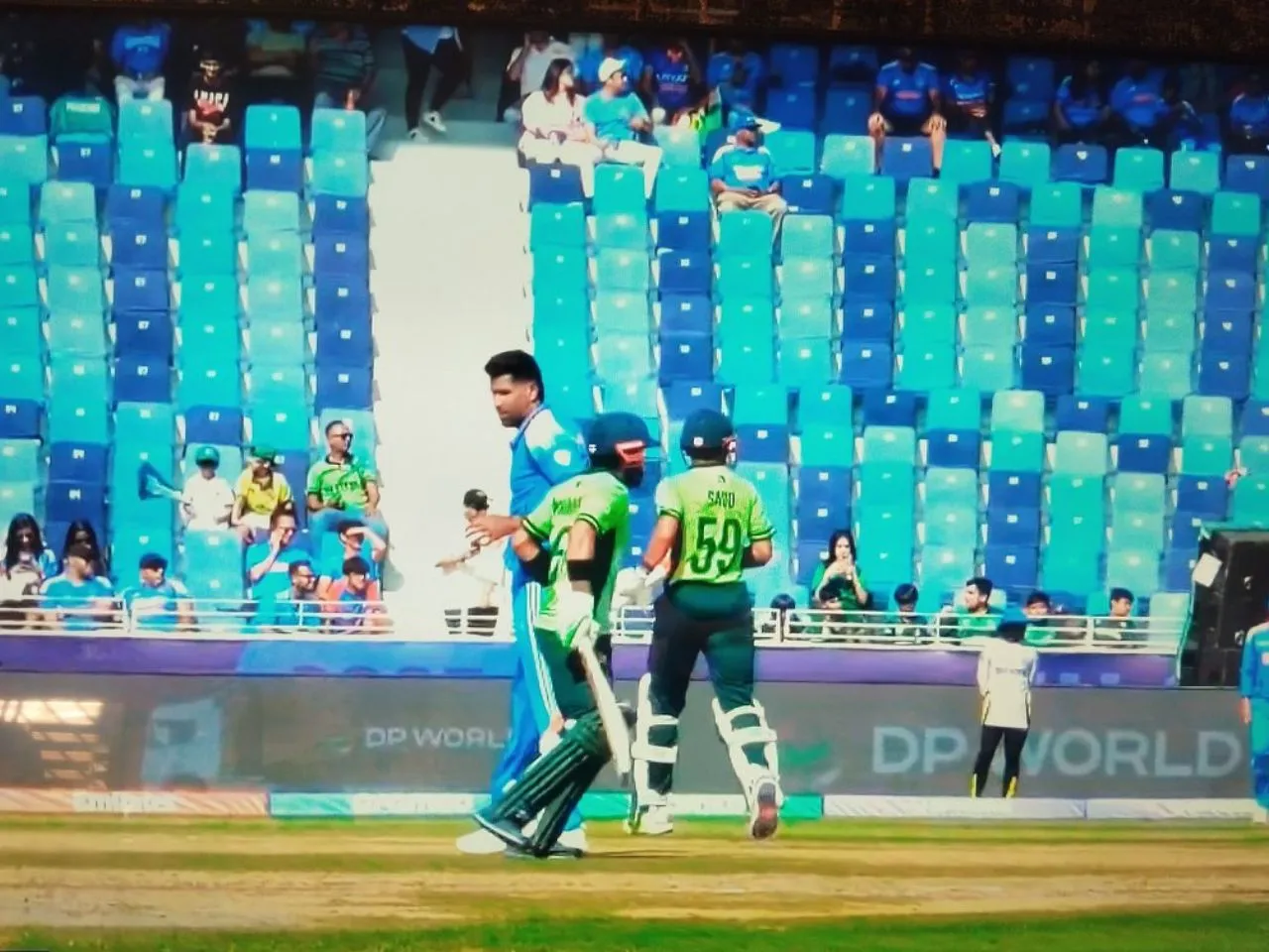Mohammad Rizwan elbows Harshit Rana