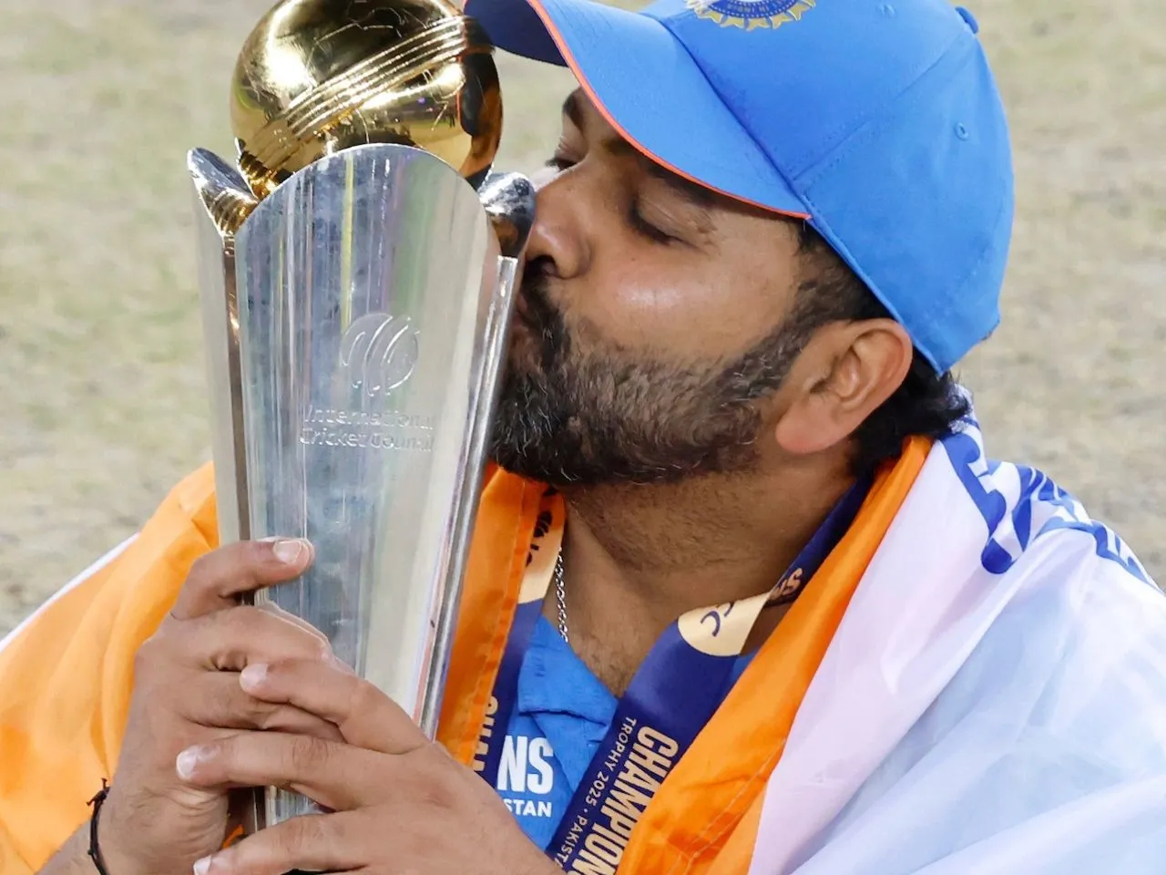 Rohit Sharma with Champions Trophy title