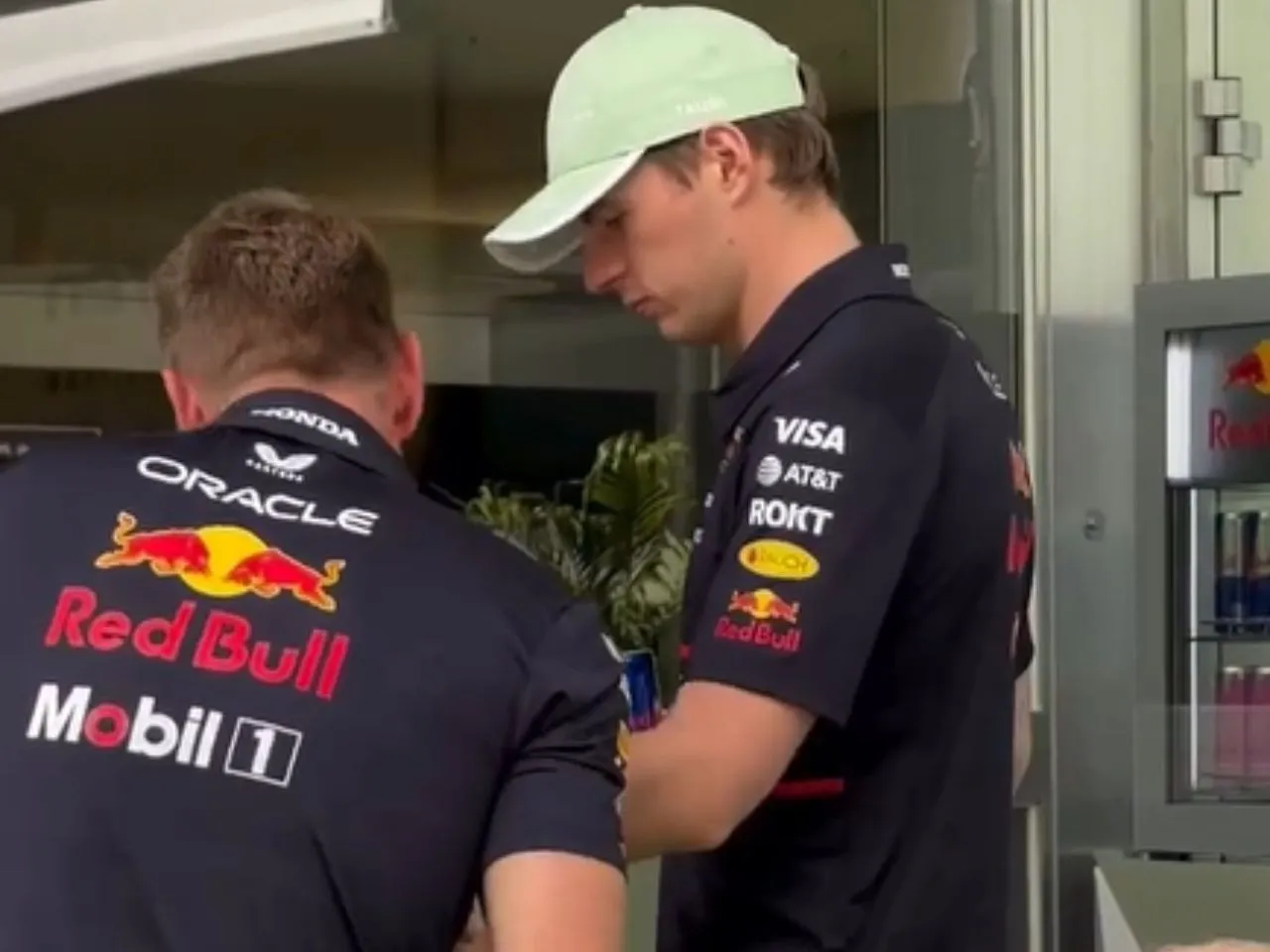 Max shows baby to his race engineer