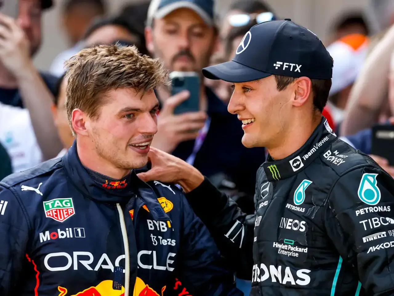 Max Verstappen with George Russell