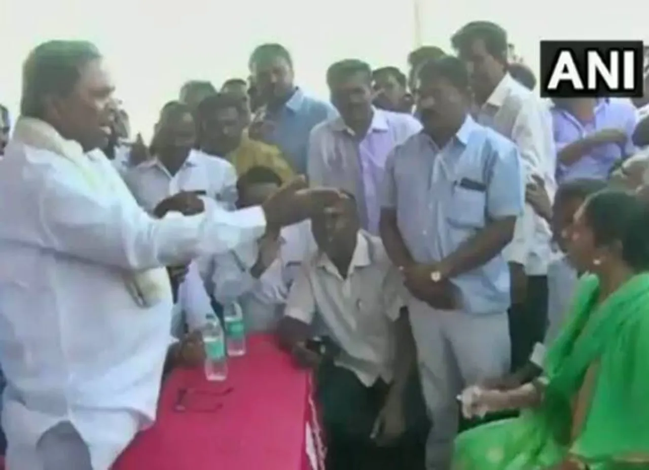 மைக்கை வாங்கிய போது கையோடு வந்த பெண்ணின் துப்பட்டா! - சர்ச்சையில் சித்தராமையா