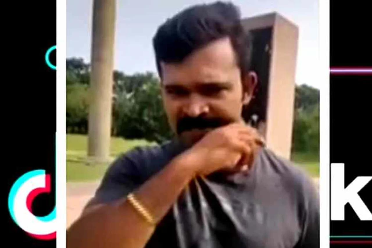 Naam Tamilar Katchi functionary tiktok video at rajiv gandhi memorial, நாம் தமிழர் கட்சி நிர்வாகி டிக்டாக் வீடியோ, ராஜிவ் காந்தி நினைவிடம், வைரல் வீடியோ, Naam thamizhar Katchi youth tiktok video, Naam Tamilar Katchi tiktok at rajiv gandhi memorial, congress party complaint on Naam thamizhar Katchi youth, rajiv gandhi memorial sriperumputhur, Naam Thamizhar Katchi