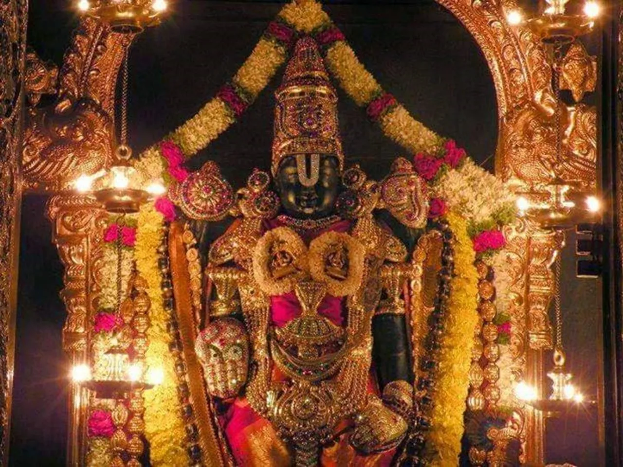 Tirumala Tirupati devotees in the long queue to get special food offerings